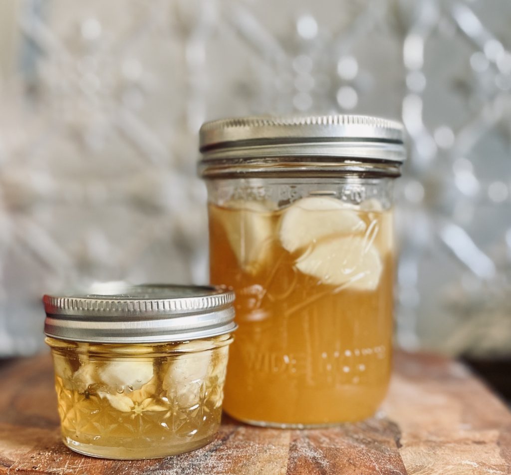 Garlic fermenting in honey