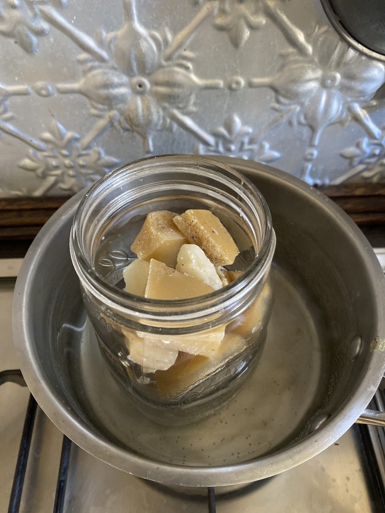 Beeswax melting in mason jar